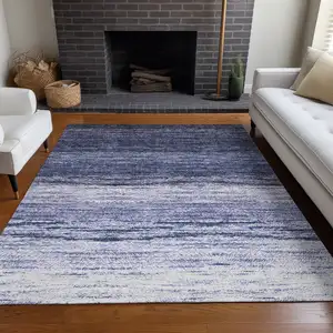 Photo of Blue And Ivory Ombre Washable Area Rug With UV Protection