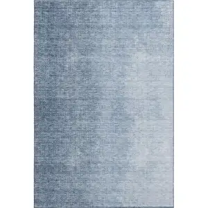 Photo of Blue And Ivory Ombre Washable Area Rug With UV Protection