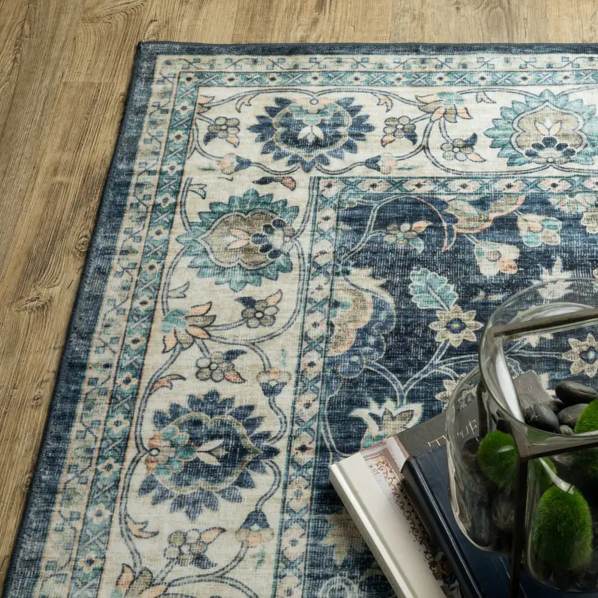 Blue And Ivory Oriental Distressed Area Rug Photo 9