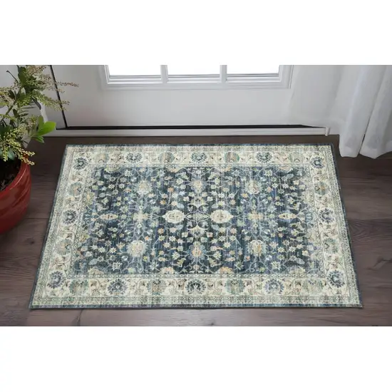Blue And Ivory Oriental Distressed Area Rug Photo 1