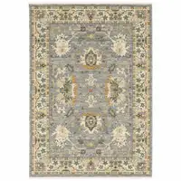 Photo of Blue And Ivory Oriental Power Loom Stain Resistant Area Rug With Fringe