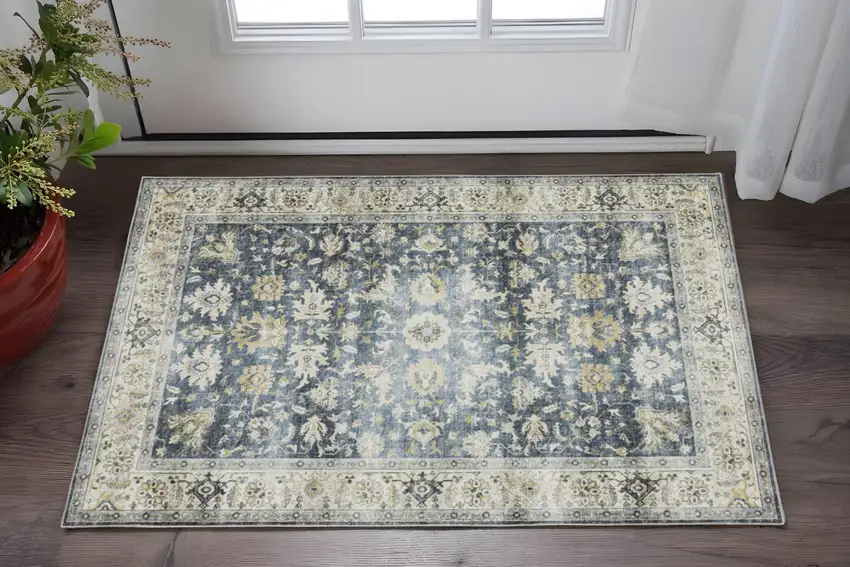 Blue And Gold Oriental Distressed Area Rug Photo 1
