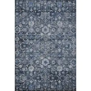 Photo of Blue And Ivory Oriental Washable Area Rug With UV Protection