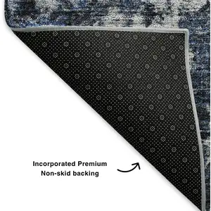 Photo of Blue And Ivory Oriental Washable Area Rug With UV Protection