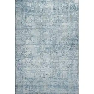 Photo of Blue And Ivory Oriental Washable Area Rug With UV Protection