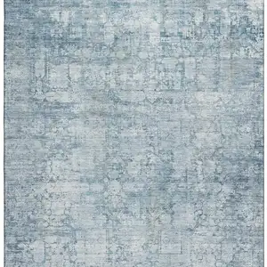 Photo of Blue And Ivory Oriental Washable Area Rug With UV Protection