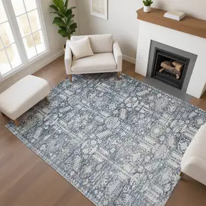 Photo of Blue And Ivory Oriental Washable Area Rug With UV Protection