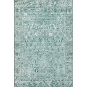 Photo of Blue And Ivory Oriental Washable Area Rug With UV Protection