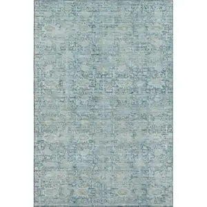Photo of Blue And Ivory Oriental Washable Area Rug With UV Protection