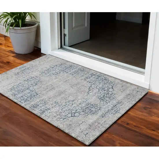 Blue And Ivory Oriental Washable Indoor Outdoor Area Rug Photo 1