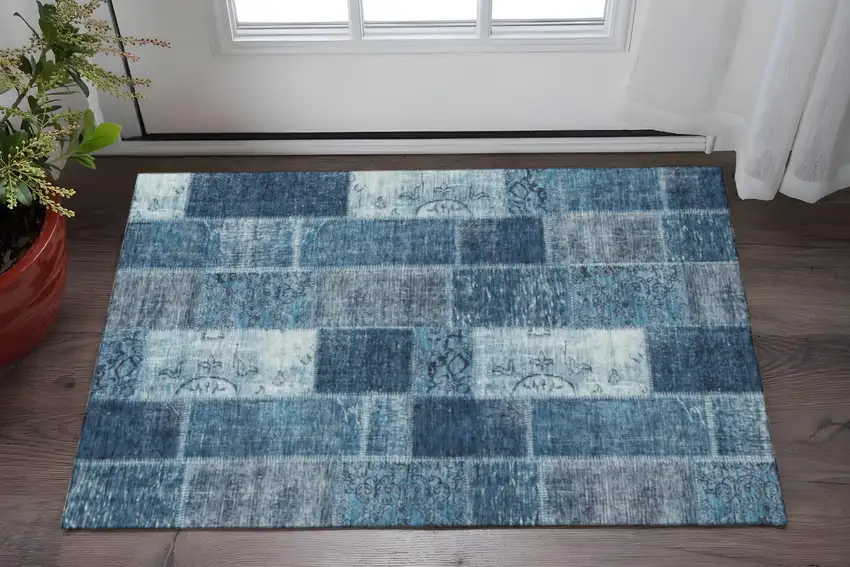 Blue And Ivory Patchwork Washable Area Rug With UV Protection Photo 2