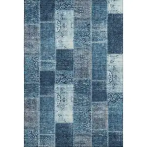 Photo of Blue And Ivory Patchwork Washable Area Rug With UV Protection