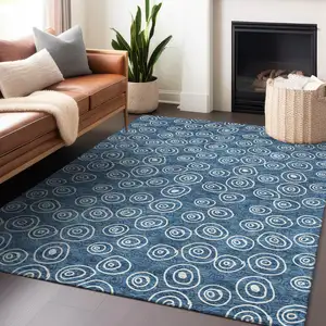 Photo of Blue And Ivory Polka Dot Washable Area Rug With UV Protection