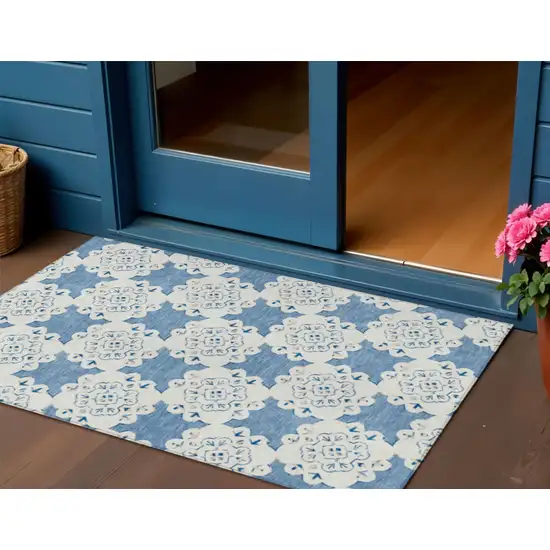 Blue And Ivory Quatrefoil Washable Indoor Outdoor Area Rug Photo 1