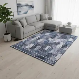 Photo of Blue And Ivory Southwestern Washable Area Rug With UV Protection