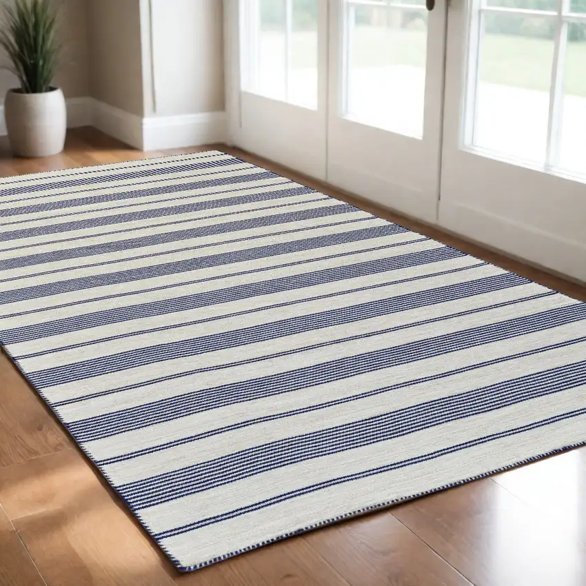 Blue And Ivory Striped Dhurrie Hand Woven Stain Resistant Area Rug Photo 1