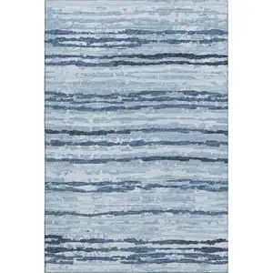 Photo of Blue And Ivory Striped Washable Area Rug With UV Protection
