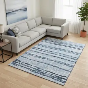 Photo of Blue And Ivory Striped Washable Area Rug With UV Protection