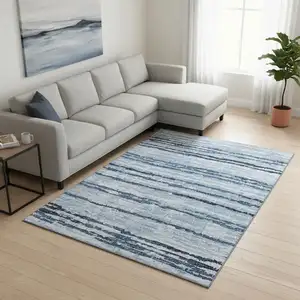 Photo of Blue And Ivory Striped Washable Area Rug With UV Protection