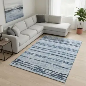 Photo of Blue And Ivory Striped Washable Area Rug With UV Protection