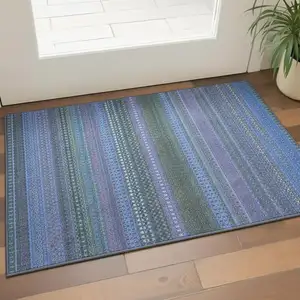 Photo of Blue And Ivory Striped Washable Area Rug With UV Protection