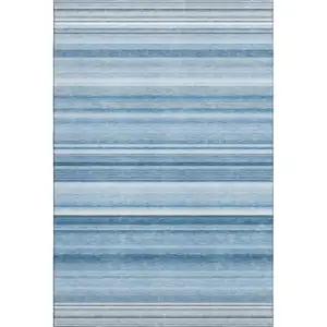 Photo of Blue And Ivory Striped Washable Area Rug With UV Protection