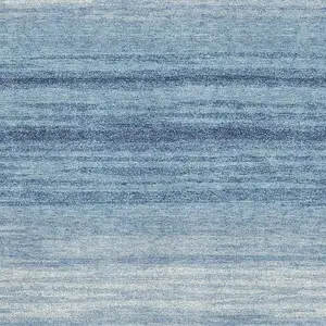 Photo of Blue And Ivory Striped Washable Area Rug With UV Protection