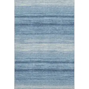 Photo of Blue And Ivory Striped Washable Area Rug With UV Protection