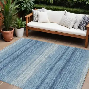 Photo of Blue And Ivory Striped Washable Indoor Outdoor Area Rug