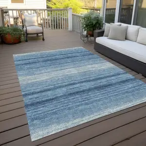 Photo of Blue And Ivory Striped Washable Indoor Outdoor Area Rug