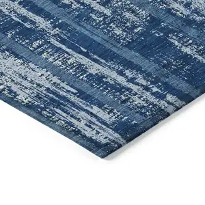 Photo of Blue And Ivory Striped Washable Indoor Outdoor Area Rug