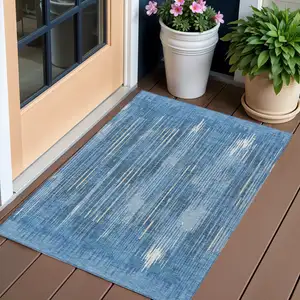 Photo of Blue And Ivory Striped Washable Indoor Outdoor Area Rug