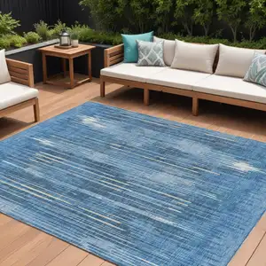 Photo of Blue And Ivory Striped Washable Indoor Outdoor Area Rug