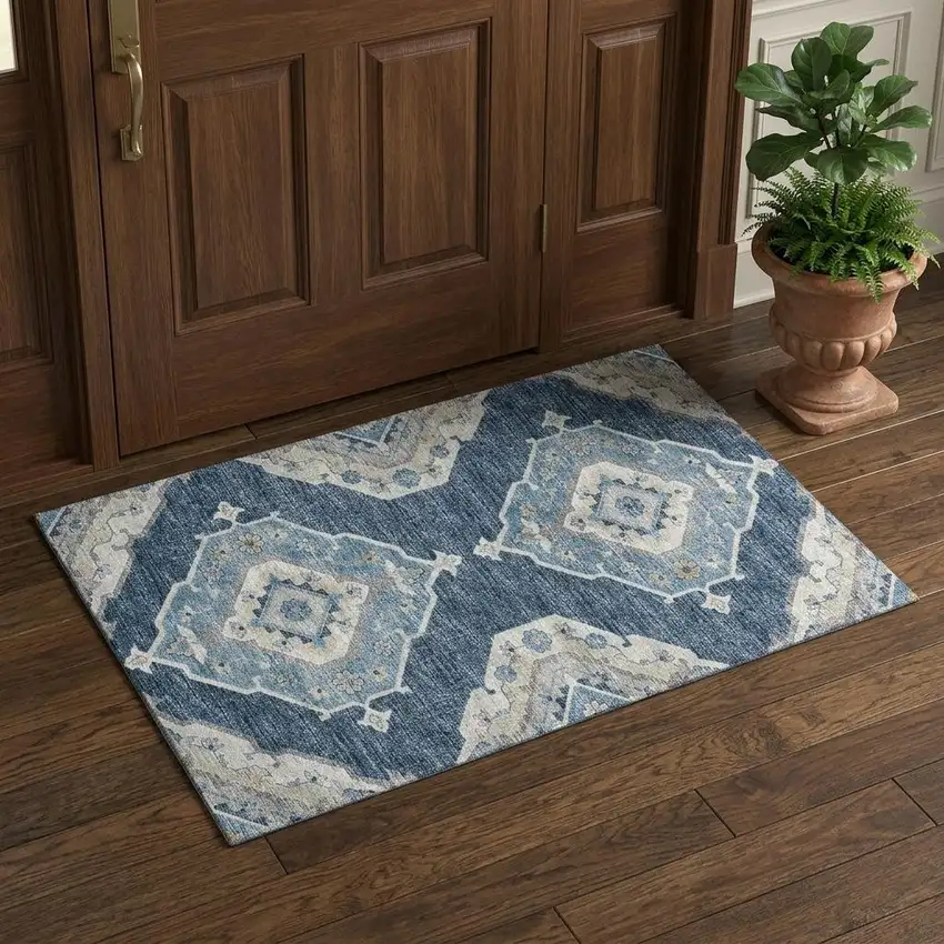 Blue And Ivory Tribal Distressed Washable Area Rug With UV Protection Photo 1
