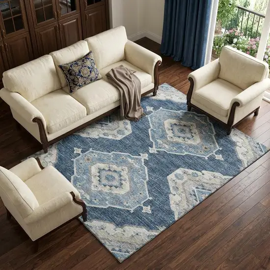 Blue And Ivory Tribal Distressed Washable Area Rug With UV Protection Photo 1