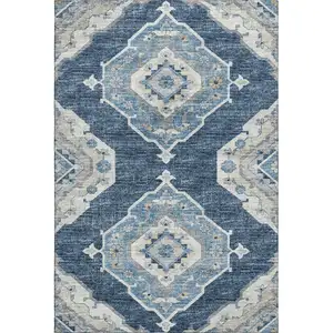 Photo of Blue And Ivory Tribal Washable Area Rug With UV Protection