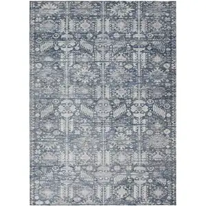 Photo of Blue And Ivory Tribal Washable Indoor Outdoor Area Rug