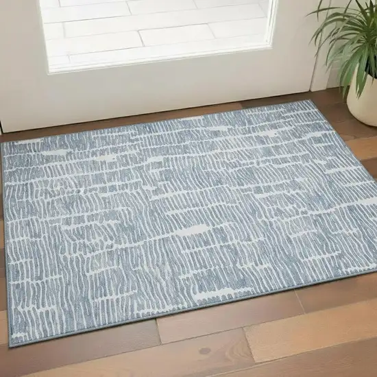 Blue And Ivory Vermicular Washable Area Rug With UV Protection Photo 1