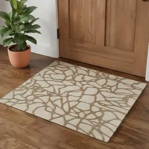 Photo of Blue And Ivory Wool Abstract Hand Tufted Area Rug