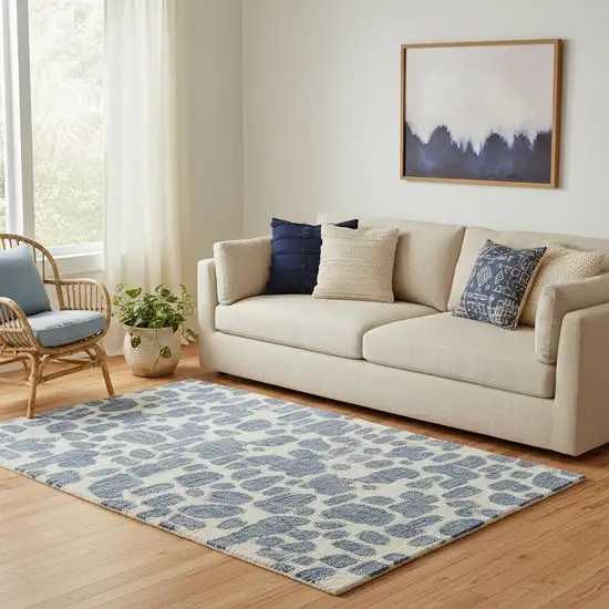 Blue And Ivory Wool Abstract Hand Tufted Area Rug Photo 1