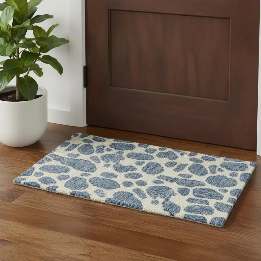 Blue And Ivory Wool Abstract Hand Tufted Area Rug Photo 1