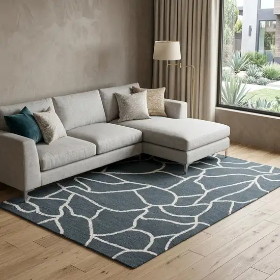 Blue And Ivory Wool Abstract Hand Tufted Area Rug Photo 1