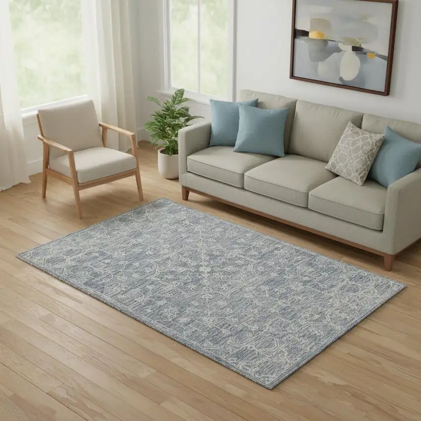 Blue And Ivory Wool Floral Hand Tufted Area Rug Photo 1