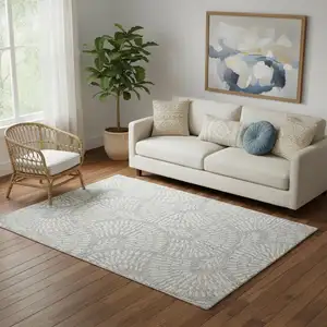 Photo of Blue And Ivory Wool Floral Hand Tufted Area Rug