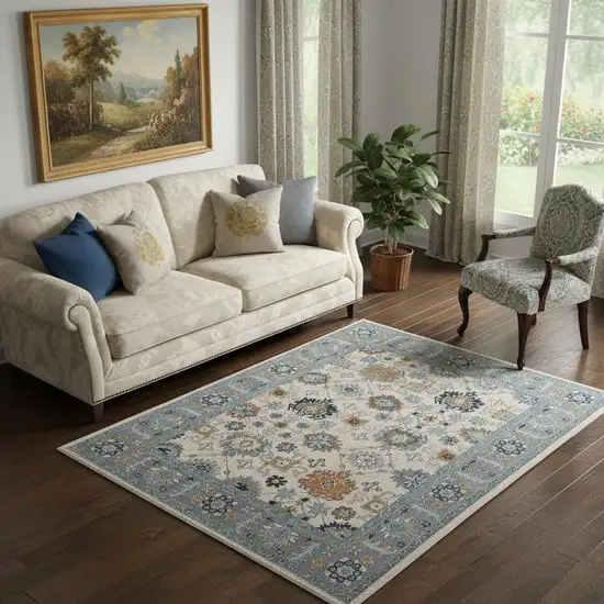 Blue And Ivory Wool Floral Hand Tufted Area Rug Photo 1