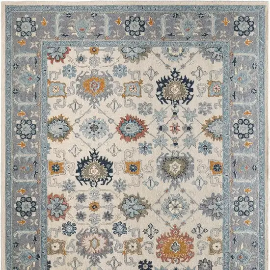Blue And Ivory Wool Floral Hand Tufted Area Rug Photo 4