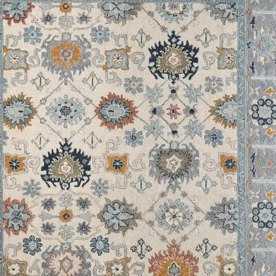 Blue And Ivory Wool Floral Hand Tufted Area Rug Photo 3