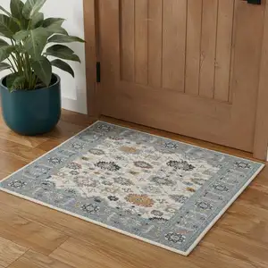 Photo of Blue And Ivory Wool Floral Hand Tufted Area Rug