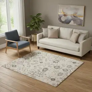 Photo of Blue And Ivory Wool Floral Hand Tufted Area Rug