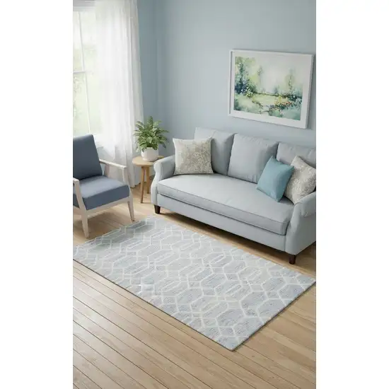 Blue And Ivory Wool Geometric Tufted Handmade Stain Resistant Area Rug Photo 1